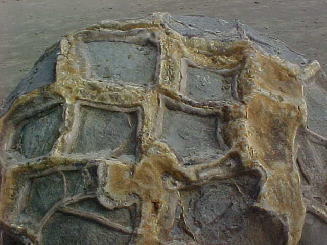 cross hatch pattern on a boulder.   (New Zealand, The Travel Addicts, South Island)