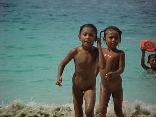 The local children playing (The Travel Addicts, Bali, Indonesia)