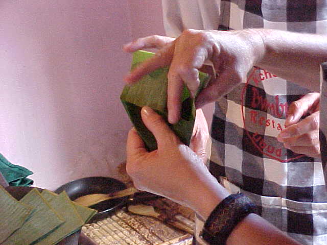 close up of SGK making a dumpling