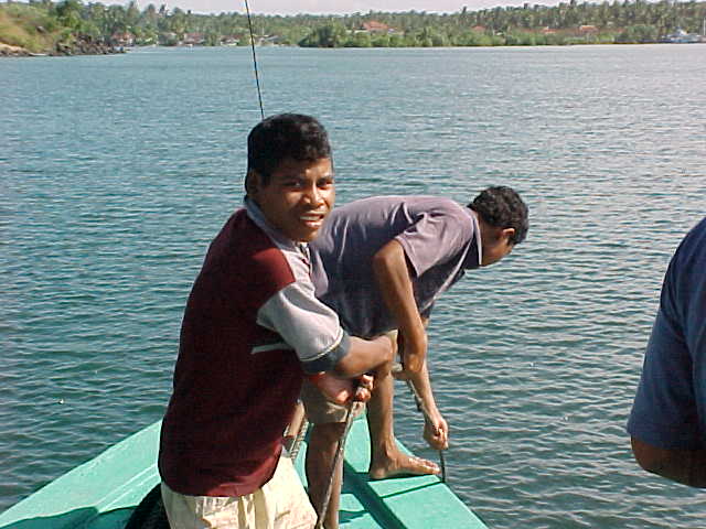 The crew of our ship pulls anchor.    Lombok, West Nusa Tenggara, Indonesia (Indonesia, The Travel Addicts, Lombok)