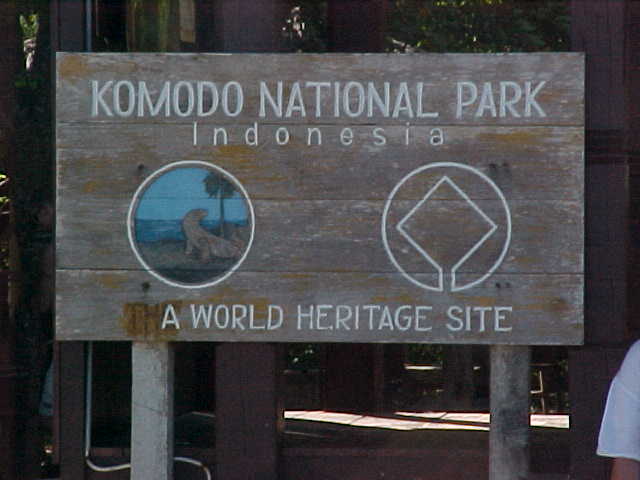 Sign says: "Komodo National Park Indonesia A World Heritage Site".  Location:Komodo National Park, Komodo, Nusa Tenggara Timur, Indonesia (Indonesia, The Travel Addicts, Komodo)