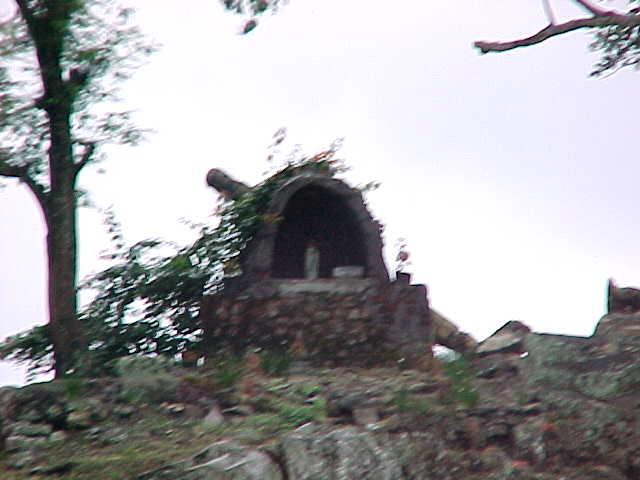 The only sign of their official Catholic religion - it was built by the government, not the people of the village (Indonesia, The Travel Addicts)