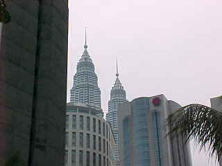 The Petronas towers peek out above the skyline