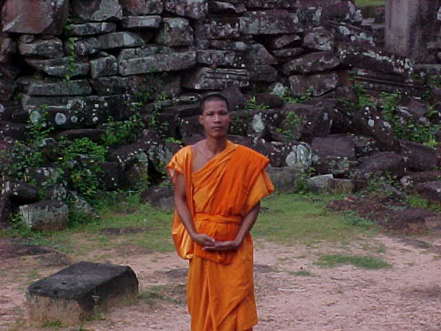 Monk : This guy would not take a tip for the photograph (Cambodia, The Travel Addicts)