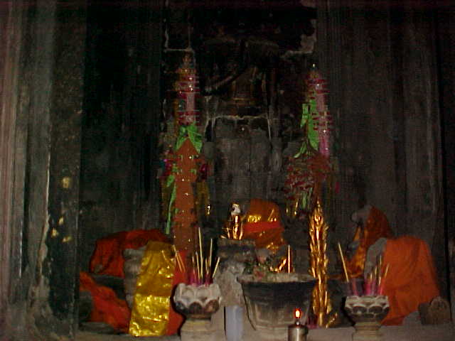 Buddhist shrine in the central tower :  (Cambodia, The Travel Addicts)