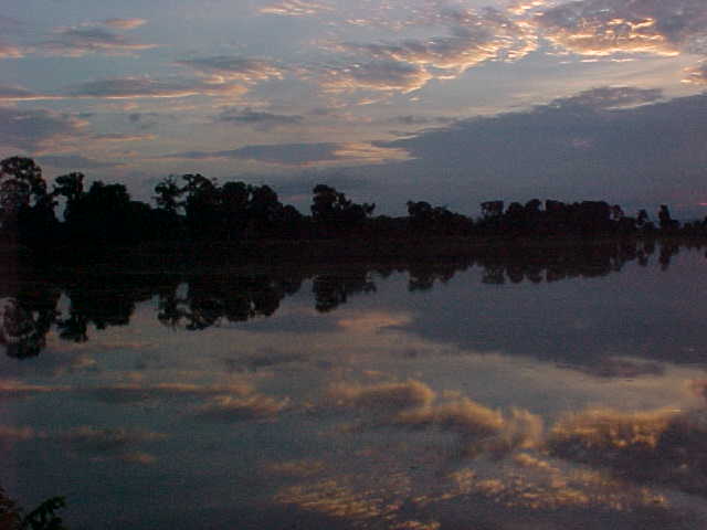 Reflection in the pool (Cambodia, The Travel Addicts)