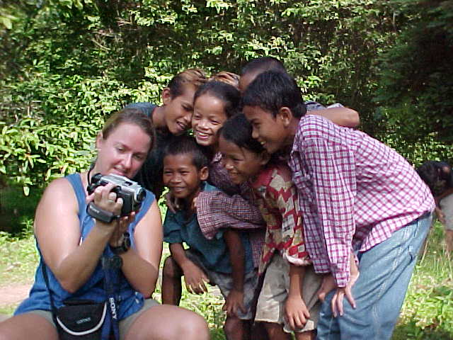 Children love seeing themselves on video :  (Cambodia, The Travel Addicts)