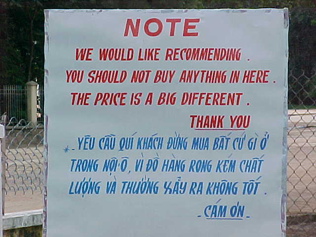 Sign outside the temple : Sign reads: \ Note \ We would like rcommending you should not buy anything in here.  The price is a big different. \ Thank you (Vietnam, The Travel Addicts)