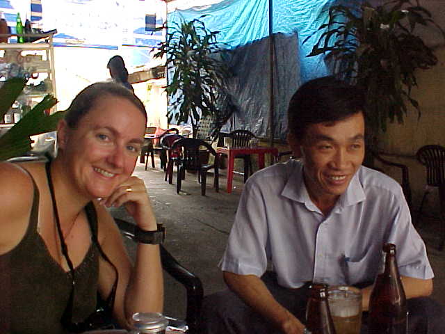 SGK and a new friend : This guy met us on a rainy day in a park.  He just walked up to us and asked if we would join him for a beer.  It turns out he was moving to Canada to be with his wife. (Vietnam, The Travel Addicts)