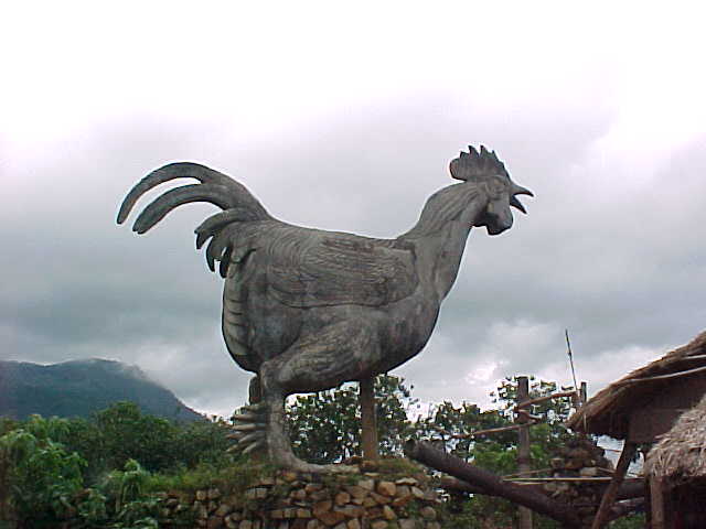 Chicken village : Our guide said that this monument was built for these people by the government as a thanks for the help in the Vietnam war (Vietnam, The Travel Addicts)