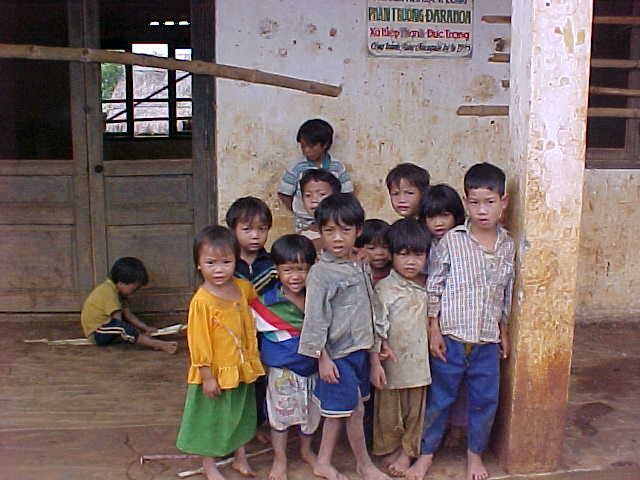 Children of the chicken village :  (Vietnam, The Travel Addicts)