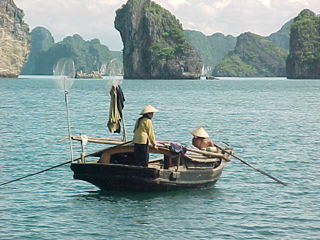 Locals on Ha Long Bay :  (The Travel Addicts, Vietnam)