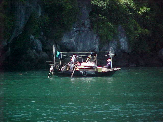 Locals on Ha Long Bay :  (The Travel Addicts, Vietnam)