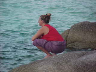 SGK practicing Yoga before the storm : Squatting Monkey (The Travel Addicts, Thailand)