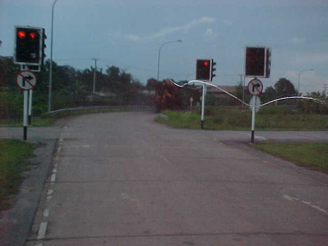 Where you stop driving on the right and start on the left : Laotians drive on the right; Thais on the left.  I always wondered how the switchover happened. (Laos, The Travel Addicts)