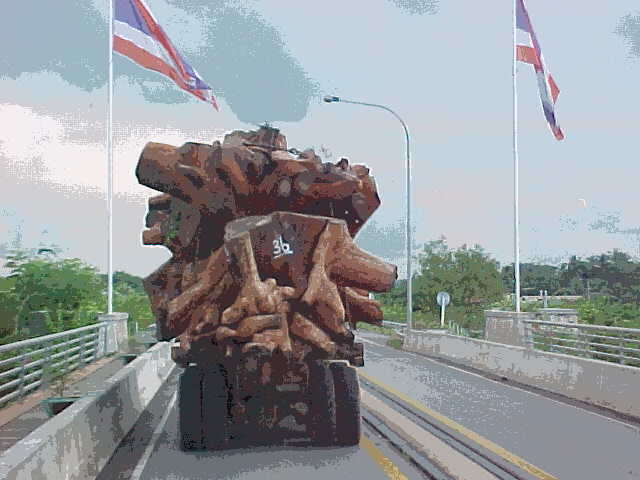 Truckload of Teak heading south : Laos' teak forests are disapearing into the furniture and architecture of Thailand (Laos, The Travel Addicts)