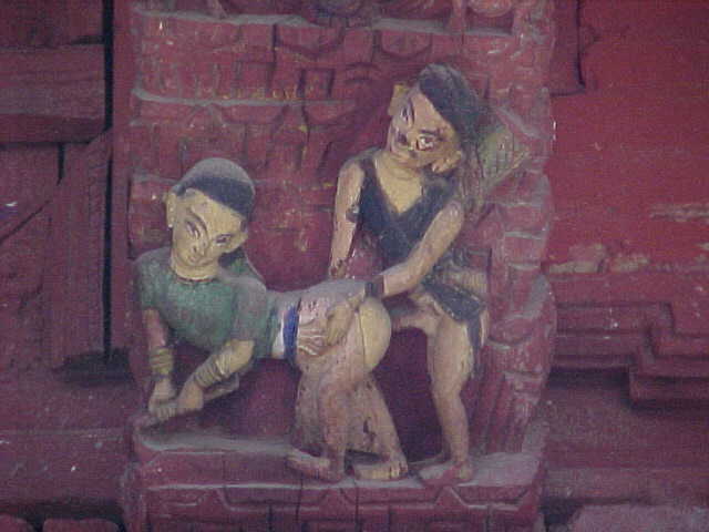 Kama Sutra : These scenes from the Kama Sutra adorn the eaves of temples to keep lightning away as the goddess of lightning is a virgin and too shy to witness such artwork (Nepal, The Travel Addicts)