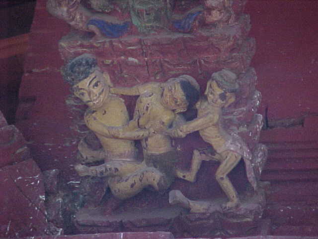 Kama Sutra : These scenes from the Kama Sutra adorn the eaves of temples to keep lightning away as the goddess of lightning is a virgin and too shy to witness such artwork (Nepal, The Travel Addicts)