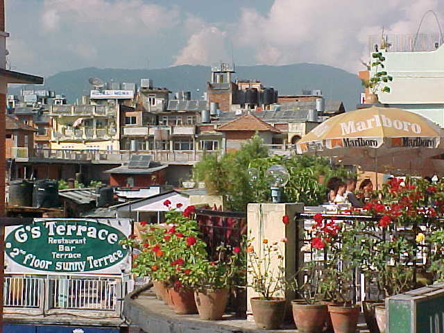 Thamel rooftops : G's Terrace is where we sat, watching the All-Blacks take on the Springboks, only to have the game interupted by an American newscaster: \ "Breaking news in the American election: No new news yet" \ Still did not know that W had won, (Nepal, The Travel Addicts)