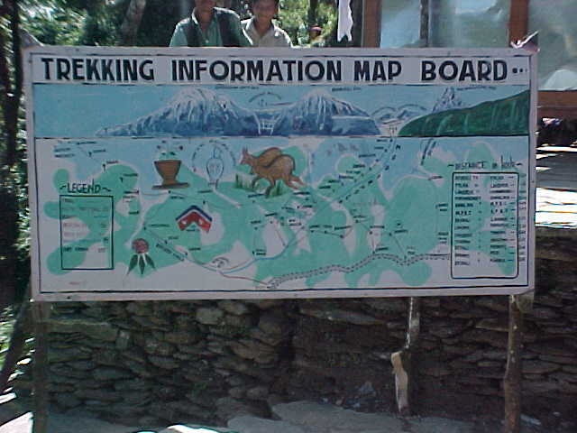 Trek board : (Sign says: Trekking Information Map Board) (Nepal, The Travel Addicts)