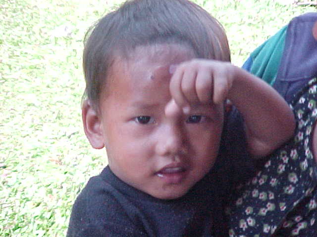 Different little boy (Nepal, The Travel Addicts)