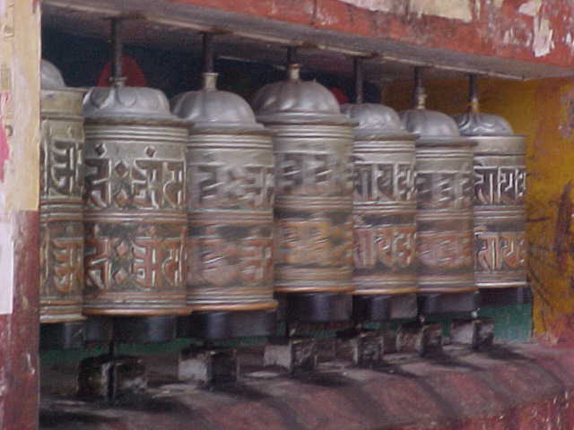 Spinning prayer wheels : A tibetan invention designed as a shortcut to saying your prayers. The prayer is on a scroll inside the wheel; spinning it clockwise says the prayer for you. (Nepal, The Travel Addicts)