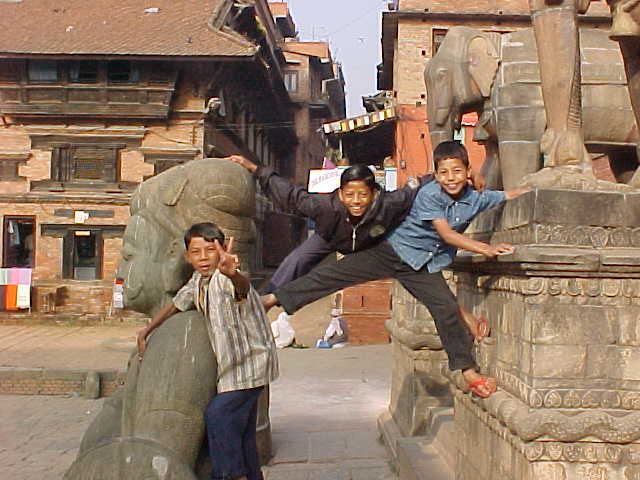 Children showing off for the camera at Nyatopala temple (Nepal, The Travel Addicts)