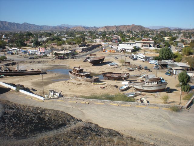 Abandonded fishing boats in the inner harbour : THe inner harbour only has water in it at the highest tide - and during this time of year, the entry is impassible by seacraft as there is too much sand