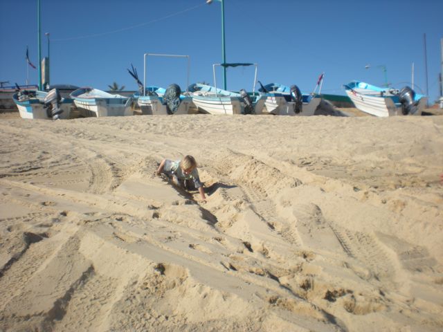 Sand surfing